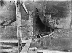 HMS HAWKE collision damage-lower hole, wood covering removed..jpg